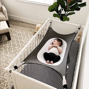 Crescent womb infant safety bed